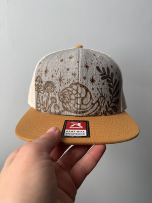 Shrooms and snail trucker hat