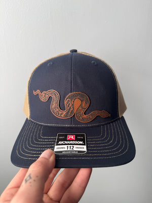 Snake patch trucker hat