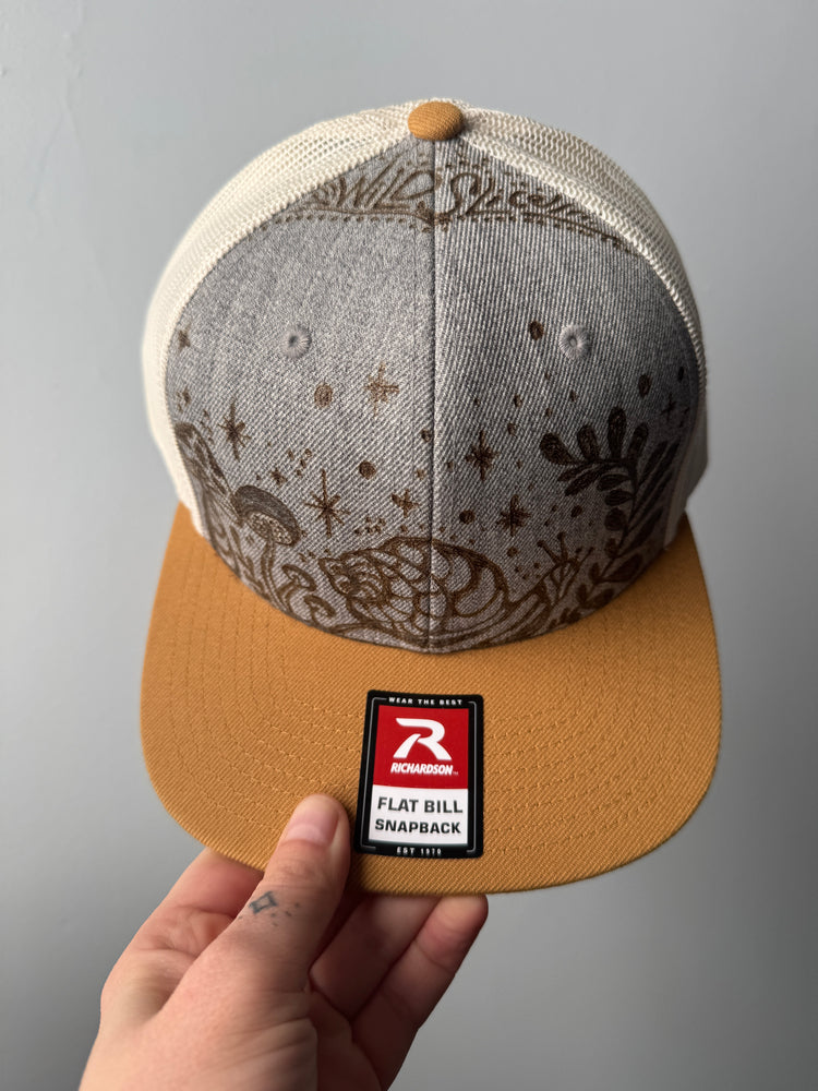 Shrooms and snail trucker hat