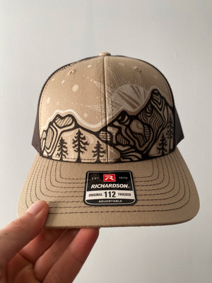 Black and White Mountain trucker hat + free sticker