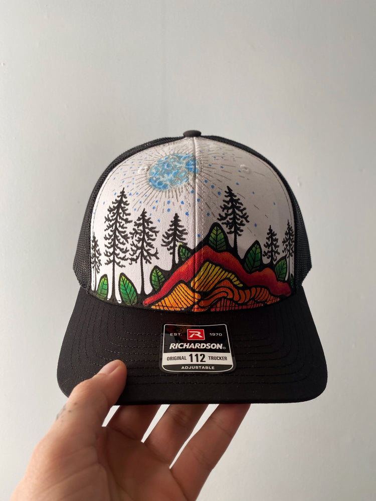 Blue Moon Mountain scene trucker hat + free sticker